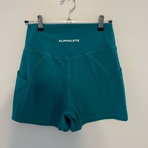 Size Medium Alphalete turquoise green shorts with pockets